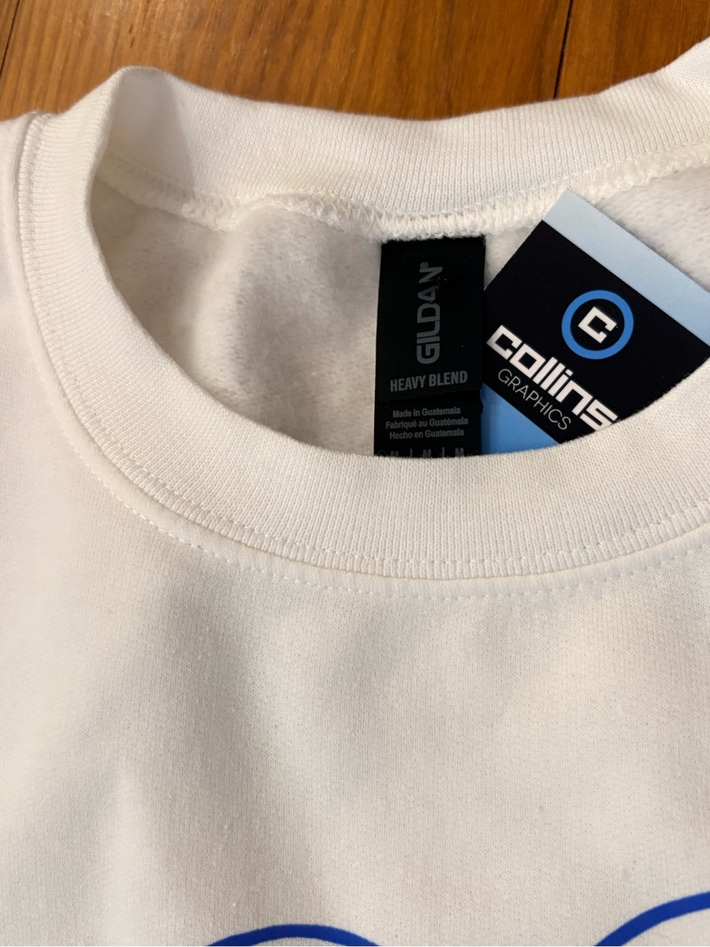 Gildan White Crewneck Sweatshirt with Blue Gingerbread Graphic - Picture 3 of 3